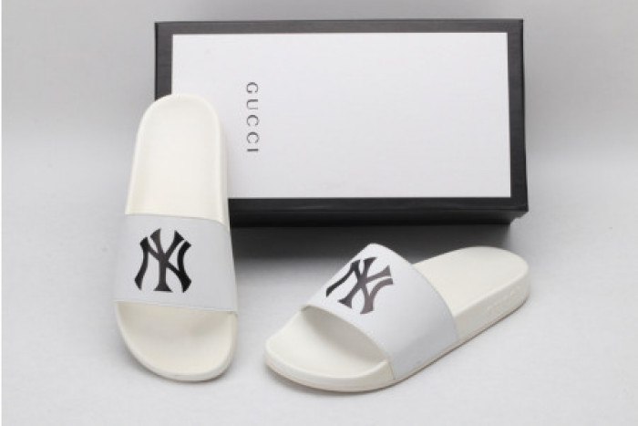 G*u*i slippers